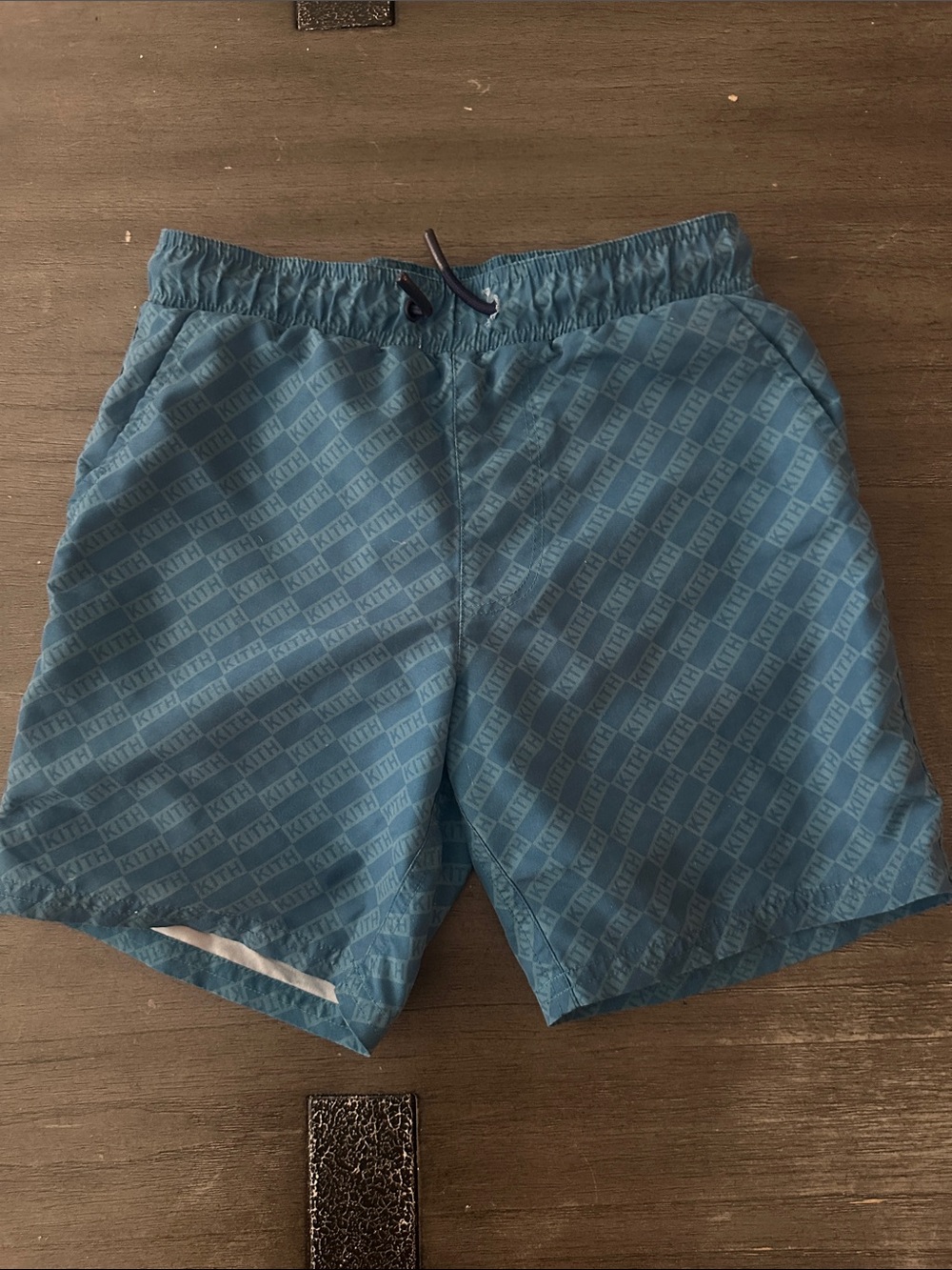 Kith Teal Allover Logo Swim Trunks